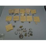 about 10 packets and some loose items, including some silver of detectorists finds
