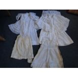 2 vintage cotton small child's broderie analgise caped dresses and 2 vintage baby/toddler sized