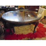 Mahogany Victorian oval extending table with one leaf and glass cover