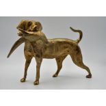A brass door stop, in the form of a dog retrieving a pheasant, 22cm tall