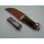 Original swiss style army knife with all components and a Bowie knife with leather case