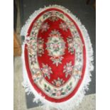Oval Red Patterned Rug 106 x 178 cm