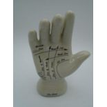 The hand- china palm reading hand figure