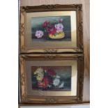 A pair of oil on board still life pictures of flowers in gilt frames 47 x 37 cm