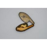 A novelty figural dog cigar holder in original case,