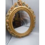 gilt with painted flowers small oval mirror 40x32cm