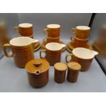 Hornsea 'Saffron' part set comprising 6 cups and saucers, 3 cake plates, 3 jugs, sauce pot and s&p