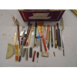 9 dip pens, erasers and other stationary items
