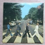 The Beatles Abbey Road Misaligned Apple Logo on the reverse.