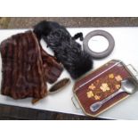 2 real fur stoles, a mirror, brush, tray and spoon