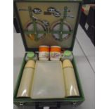 Retro picnic basket in hard case with original items inside including thermos flasks etc circa