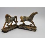 A pair of hard stone horses, 16 x 14cm