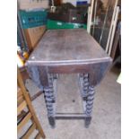 Barley twist gate leg table. split in top