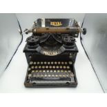 Vintage Royal typewriter with cover (the cover is pretty perished)