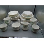 Royal Stafford part dinner service, white with flower design comprising of 6 dinner plates, 6 side
