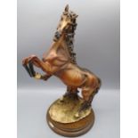 Signed bucking horse figurine 13"tall