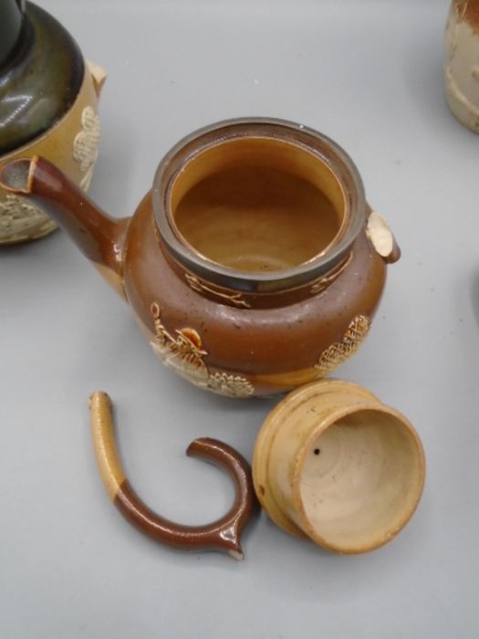 Early Doulton stoneware jugs and teapot plus one in similar style, all as found - Image 10 of 13