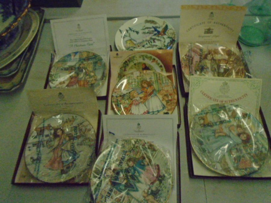 Royal Worcester picture plate, boxed with certificates plus one Wedgwood 'skating on the fen'