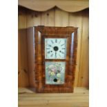 An American cased wall clock, the glass panel door decorated with flowers