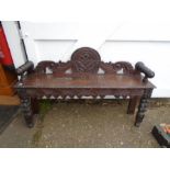 Victorian heavily carved bench/settle