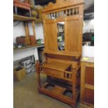 Pine hall stand, H-81" W36" D 16" hooks on back also. Drip trays are missing