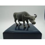 A bronze figure of a Water Buffalo with a green Verdigris finish 10cm width x 6cm height.