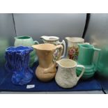 Collection of 7 jugs to incl Arthur Wood, Delcroft ware, Devon ware etc