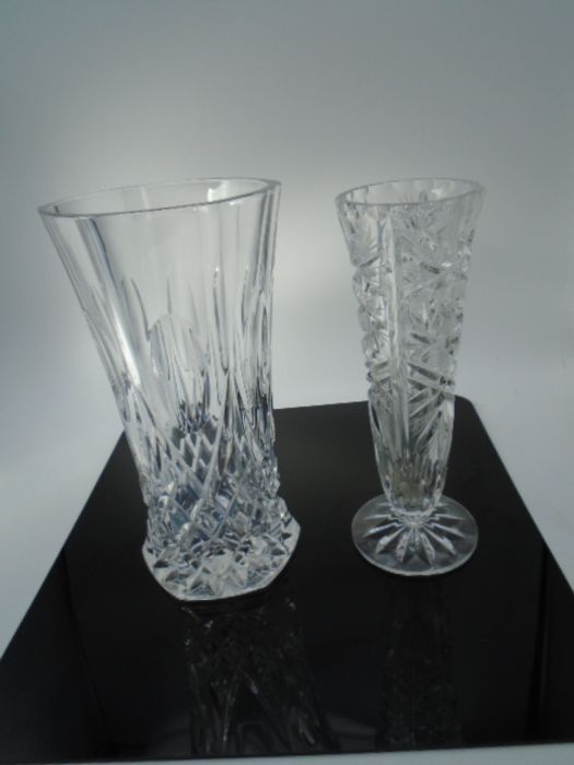 2 cut glass vases, approx 20cm and 22cm tall