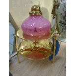 pink glass 'skruf' hand painted oil lamp burner with brass stand, in working condition with wick