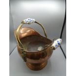 Brass coal bucket with porcelain handles