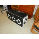 Black and white leather ottoman/blanket box, 125cm wide x 55cm tall x 47cm deep