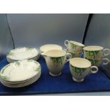 Crownford Burslem part tea set includes 6 side plates, 6 saucers, 5 cups, milk jug and sugar bowl