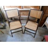2 folding cane seated occasional chairs
