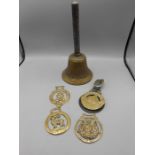 Brass bell and horse brasses