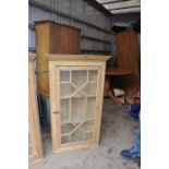 A pair pine glazed corner cupboards, 107cm H, 65cm W, 35cm D