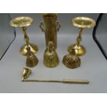 Brass Eastern design vase, candlesticks, snuffer and brass bells