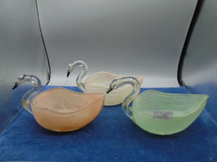 3 clear and coloured glass swans