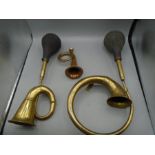 2 brass car horns and hunting horn