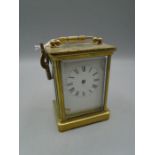 A 5 glass carriage clock 4 1/4" high not inc handle, with key. hands loose in case