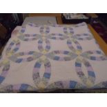 2 quilted double bedspreads in pink and blue