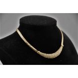 Christian Dior gilt woven necklace with rhinestone set stones