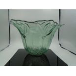 A large glass art deco style bowl 21 cm tall x 40cm at the widest point.