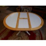 Extending tile topped pine pedestal table W107cm (145cm when extended} One broken tile.