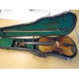 2 violins in cases, as found