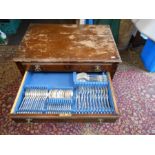 AN oak two drawer side table with brass handles and cutlery contents. W 70cm, D 48cm, H78cm