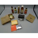 Vintage household bottles, brass porter bell, Ronson lighter, gnome rangefinder and vintage box