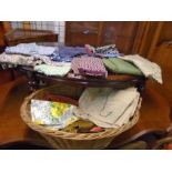 Basket of vintage material including leatherette, a part made rag rug, a rug, pelmet