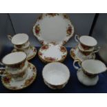 Royal Albert 'country Roses' part tea set for 6 - cake serving plate, 6 cake plates, 6 cups and