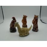 2 Beswick Beneagles scotch whiskey decanters of the Loch Ness Monster and an eagle plus 2 Wade