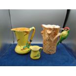 Weatherby Hanley Royal Falcon Ware Woodpecker on a tree water jug plus 2 Burleigh ware kingfisher